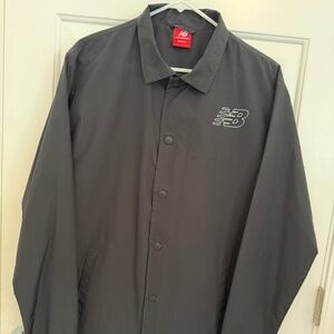 New without tags New Balance Coaches Varsity Snap Jacket Black - Size Medium